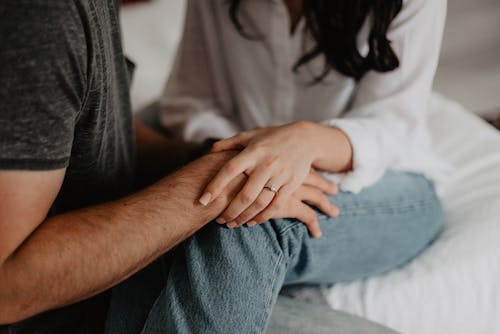 Free Woman Holding Man's Hand Stock Photo